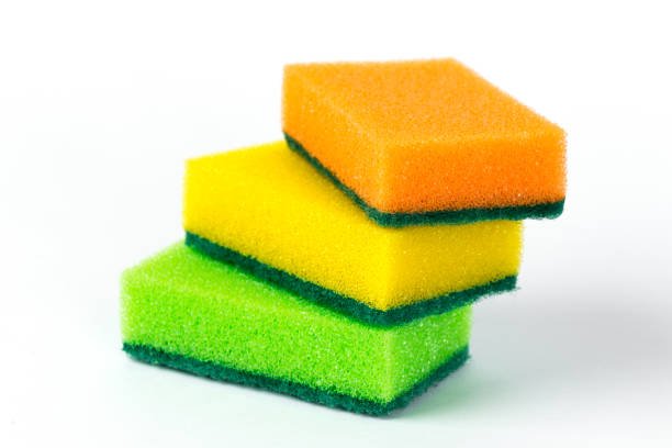 three sponges for washing dishes isolated on white background